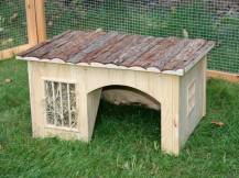 Obrázek k výrobku 125265 - Domeček pro králíky s jeslemi na seno KERBL 82759, 42x34,5x27 cm